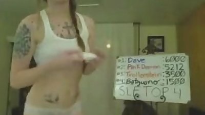 Dance! Sexy tattoed Woman dances and teases